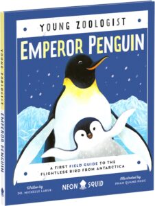 Book cover titled "young zoologist emperor penguin" by dr. michelle laue, illustrated by pham quang phuc. depicts a large emperor penguin with a chick, surrounded by snowflakes, set against icy mountains.